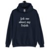 Navy blue hoodie sweatshirt with the text 'Ask me about my fetish' printed on the front.