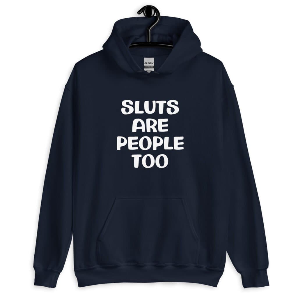 Navy blue hoodie sweatshirt with the text 'Sluts are people too' printed on the front.