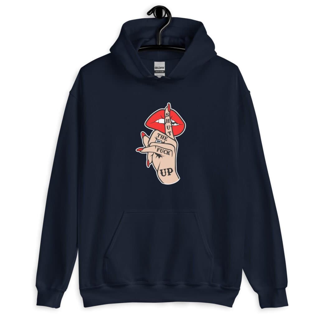 Navy blue hoodie sweatshirt with an image of a hand over lips making the shh gesture. The words 'Shut the fuck up' are printed on the hand. The graphics are printed on the front.
