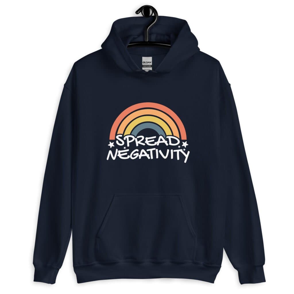 Navy blue hoodie sweatshirt with a graphic of a rainbow and the words 'Spread negativity' printed on the front.