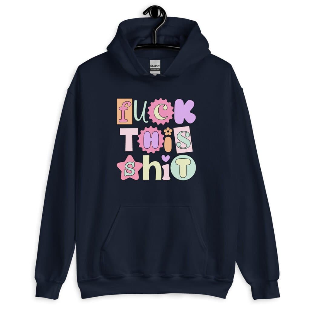 Navy blue hoodie sweatshirt with colorful pastel font 'Fuck this shit' graphics printed on the front.