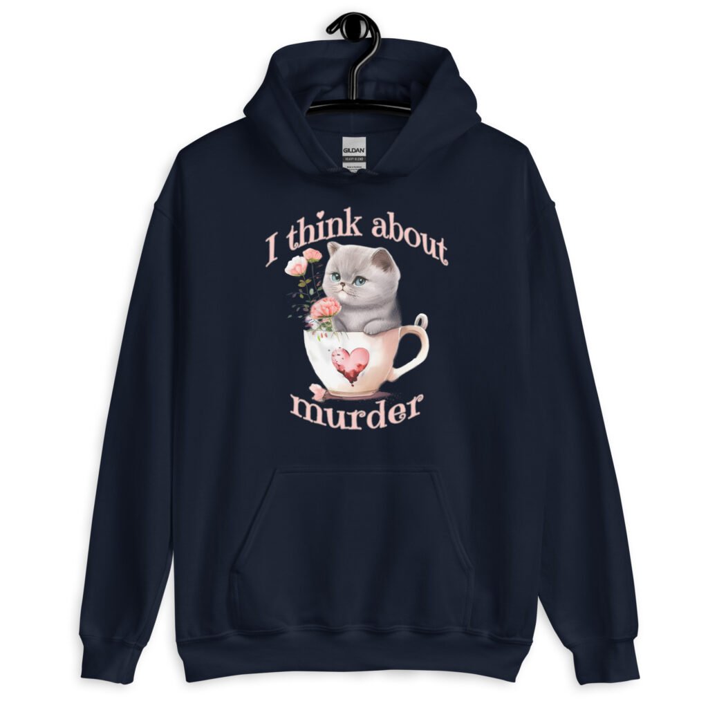 Navy blue hoodie sweatshirt that says 'I think about murder' with image of cute fluffy kitten sitting in a teacup printed on the front.