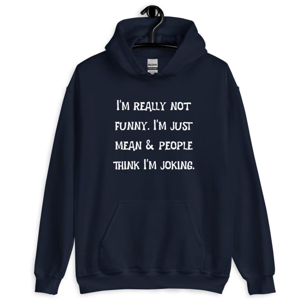 Navy blue hoodie sweatshirt with the text 'I'm really not funny. I'm just mean & people think I'm joking' printed on the front.