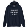 Navy blue hoodie sweatshirt with the text 'Normal people scare the crap out of me' printed on the front.