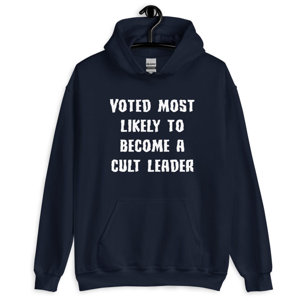Navy blue hoodie sweatshirt with the text 'Voted most likely to become a cult leader' printed on the front.