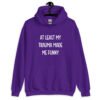 Purple hoodie sweatshirt with the text 'At least my trauma made me funny' printed on the front.