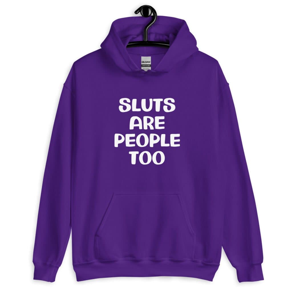 Purple hoodie sweatshirt with the text 'Sluts are people too' printed on the front.