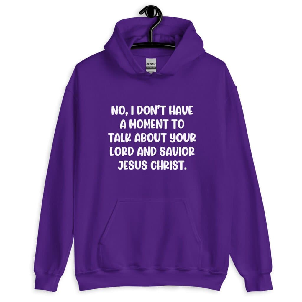 Purple hoodie sweatshirt with the phrase 'No, I don't have a moment to talk about your lord and savior Jesus Christ.' printed on the front.