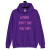 Purple hoodie sweatshirt with the words 'Women don't owe you shit' printed on the front in pink.