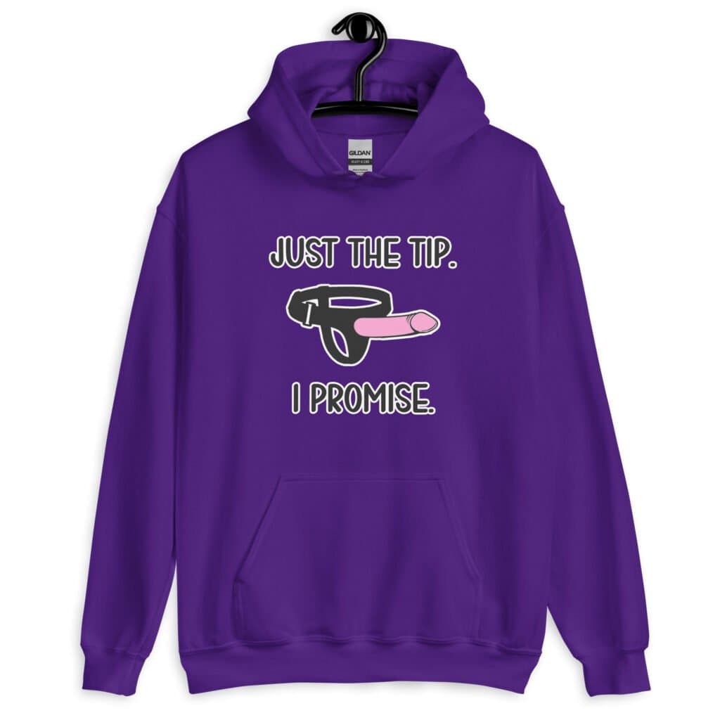 Purple hoodie sweatshirt that has an image of a strap-on dildo and the words 'Just the tip. I promise.' printed on the front.