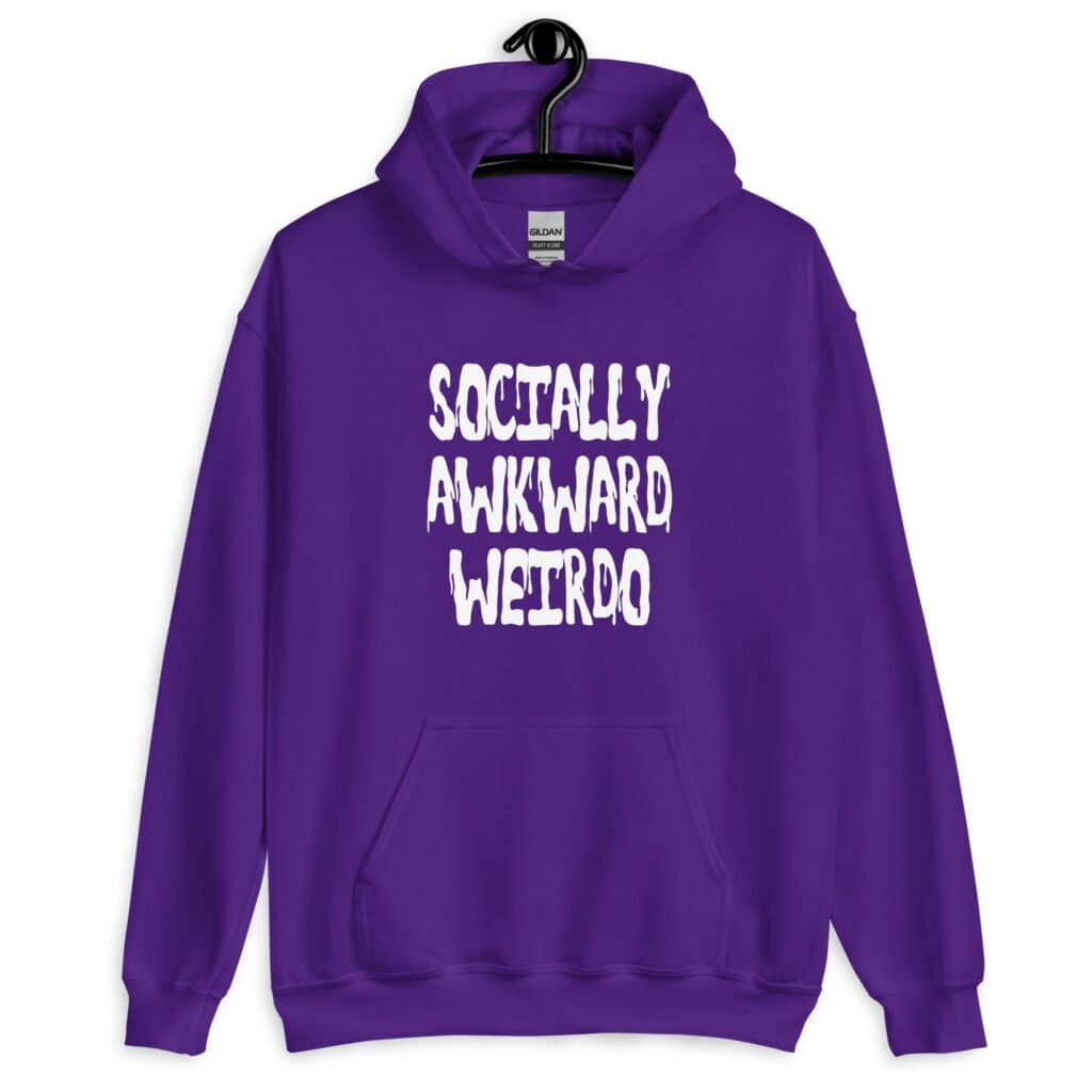 Purple hoodie sweatshirt with the text 'Socially awkward weirdo' printed on the front.