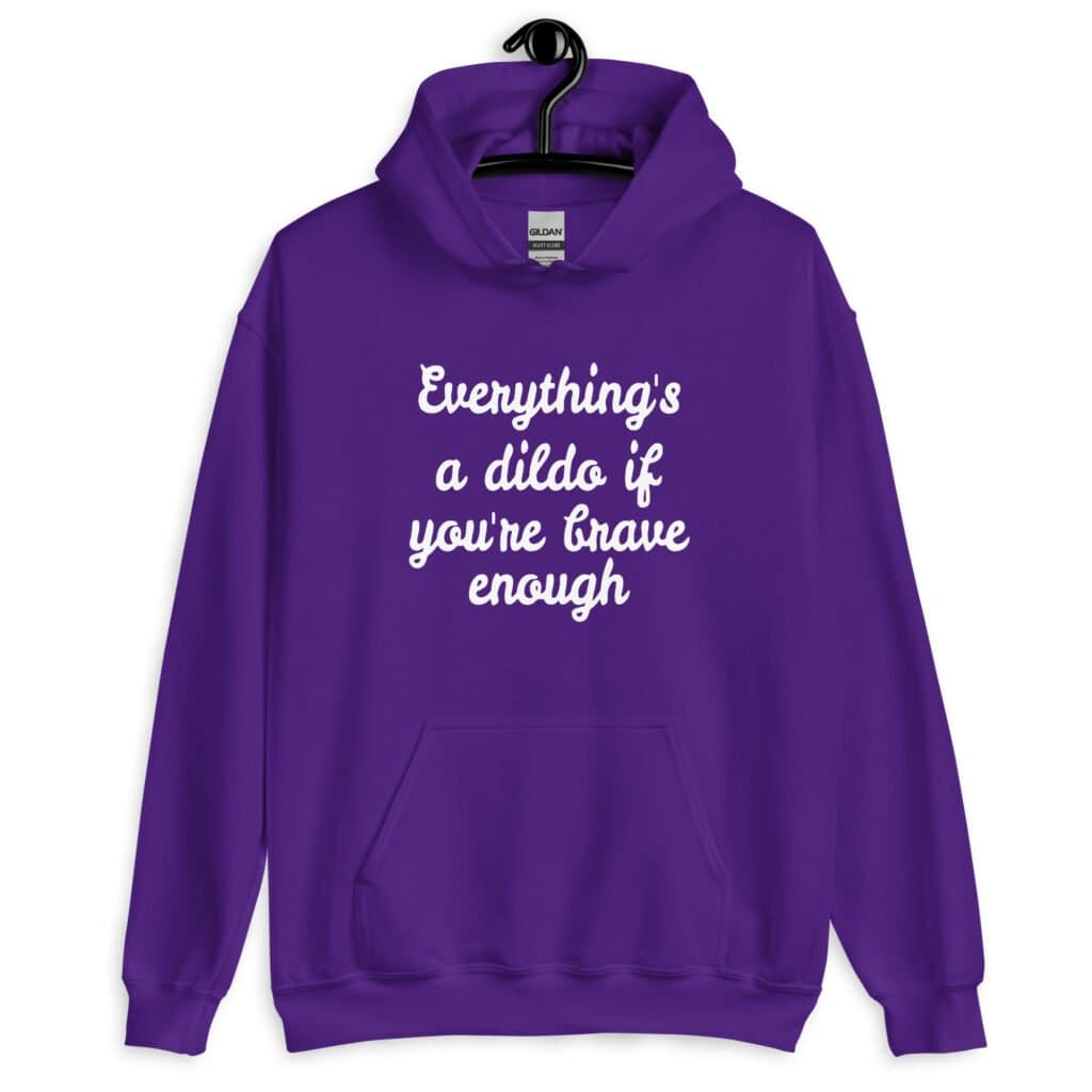 Purple hoodie sweatshirt with the text 'Everything's a dildo if you're brave enough' printed on the front.