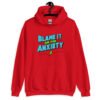 Red hoodie sweatshirt with the phrase 'Blame is on the anxiety' printed on the front. The graphics are bold and in aqua and lime green.