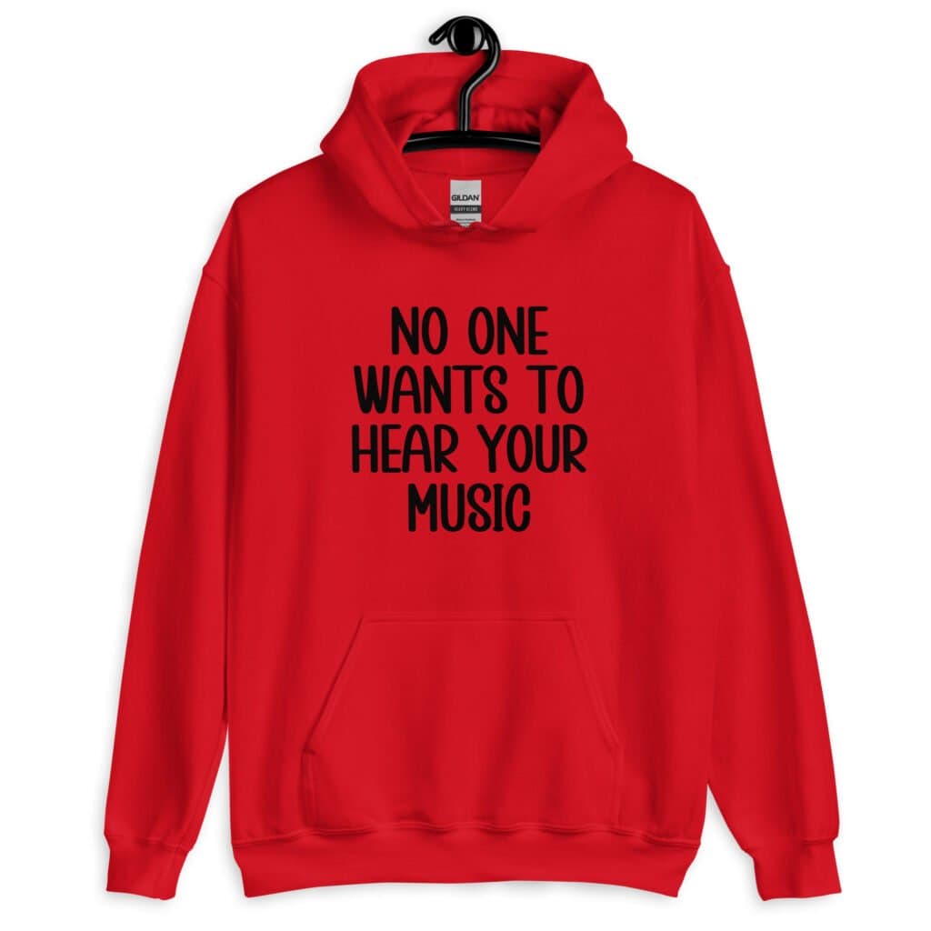 Red hoodie sweatshirt with the text 'No one wants to hear your music' printed on the front.