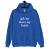 Royal blue hoodie sweatshirt with the text 'Ask me about my fetish' printed on the front.