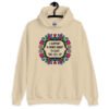 Sand color hoodie sweatshirt with a colorful doodle graphic and the words 'I support a man's right to shut the hell up.' The design is printed on the front.