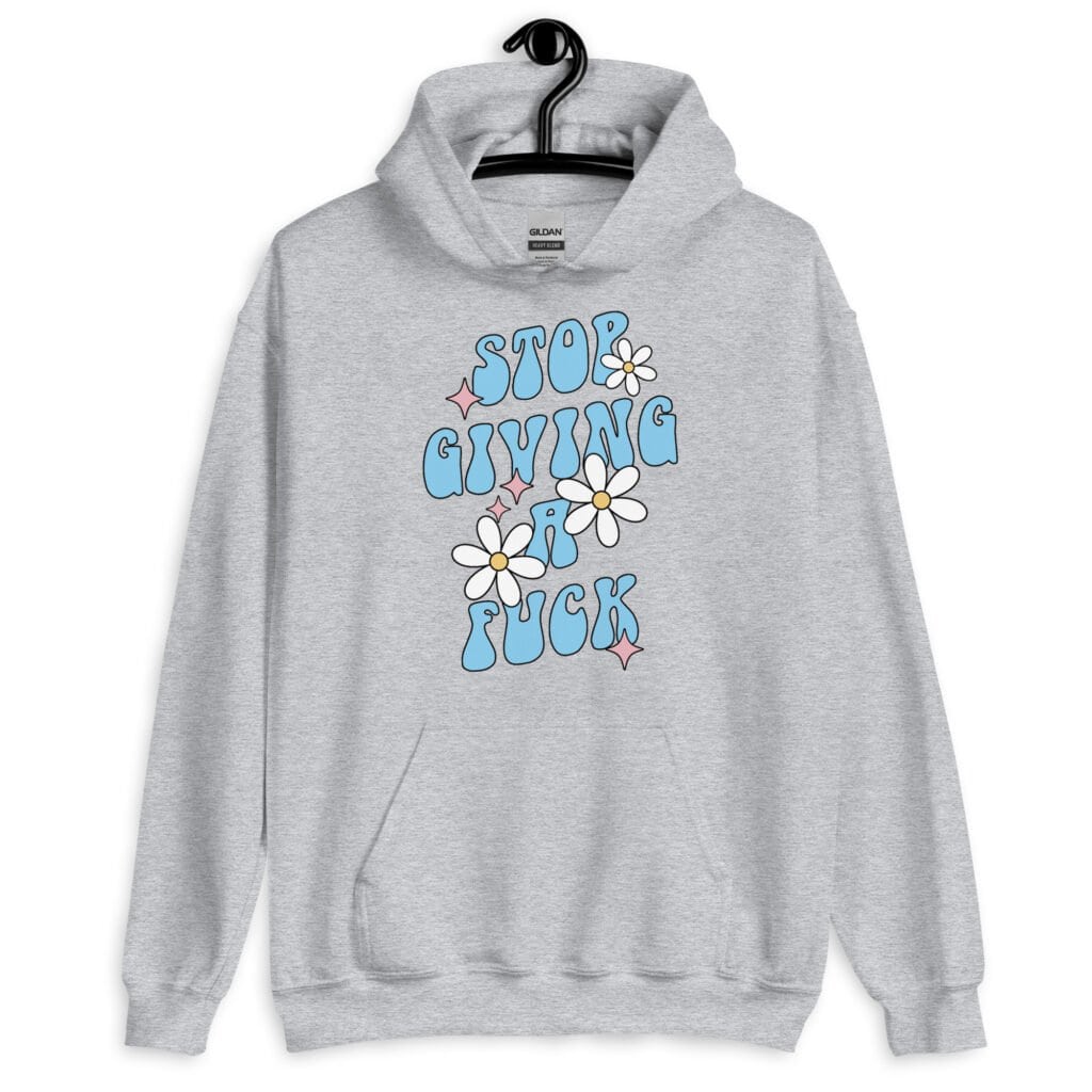 Sport grey hoodie sweatshirt with a retro daisy and star design and the text 'Stop giving a fuck' printed on the front.