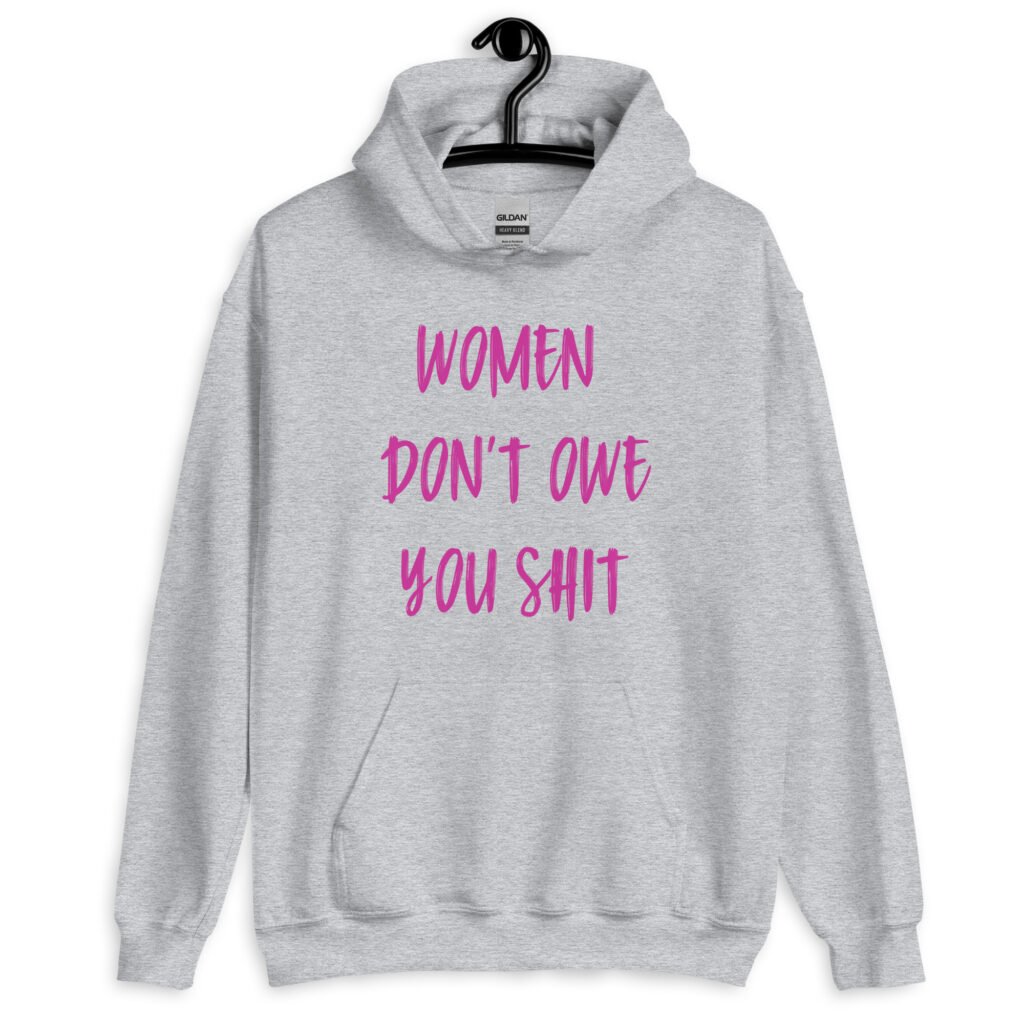 Sport grey hoodie sweatshirt with the words 'Women don't owe you shit' printed on the front in pink.