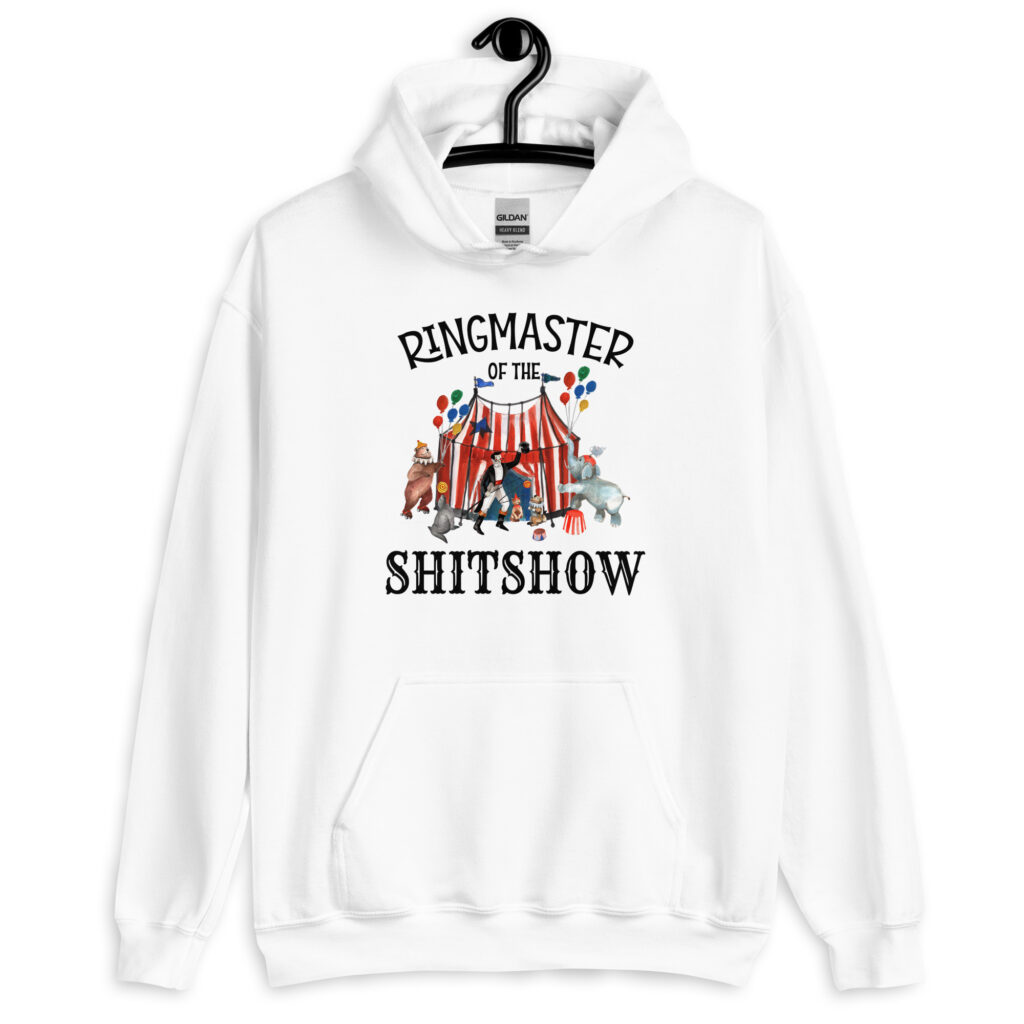 White hoodie sweatshirt with a circus theme graphic and the text 'Ringmaster of the Shitshow' printed on the front.