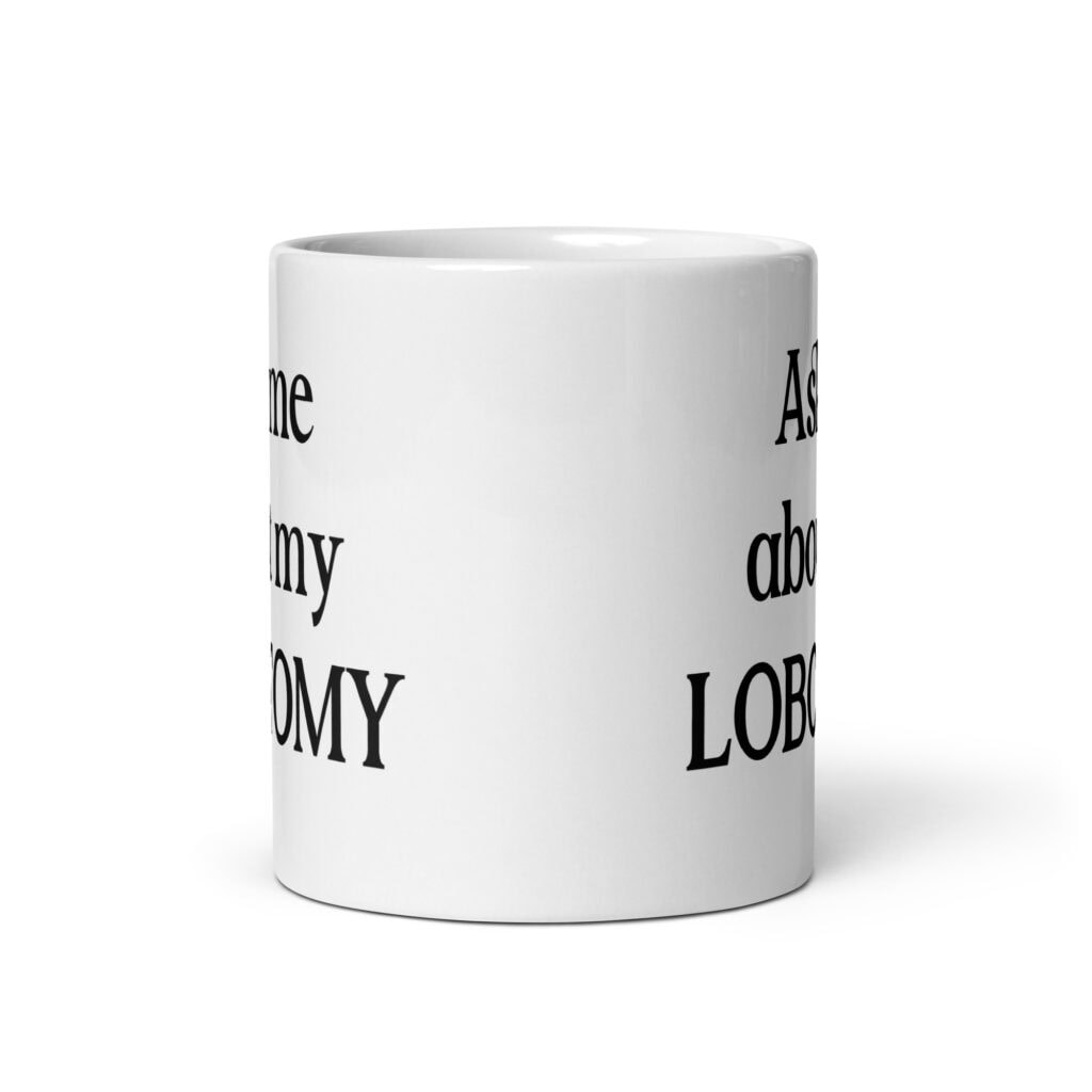 White ceramic mug with the text 'Ask me about my lobotomy' printed on both sides.