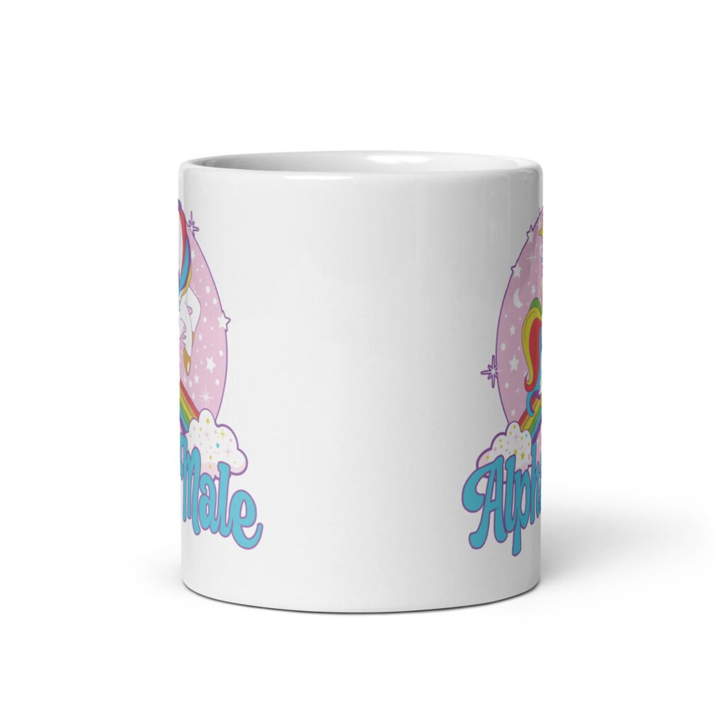 White ceramic mug with funny pastel rainbow unicorn graphics and the words Alpha Male printed on both sides.