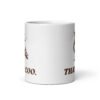 White ceramic mug with an image of a pigeon and the words 'That's coo.' printed on both sides.