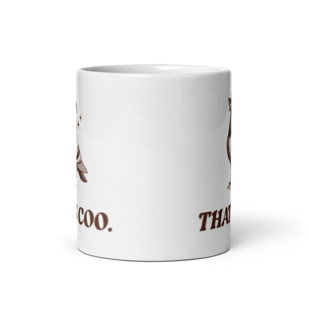 White ceramic mug with an image of a pigeon and the words 'That's coo.' printed on both sides.