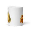 White ceramic mug with an image of tater tots and two pears printed on both sides.