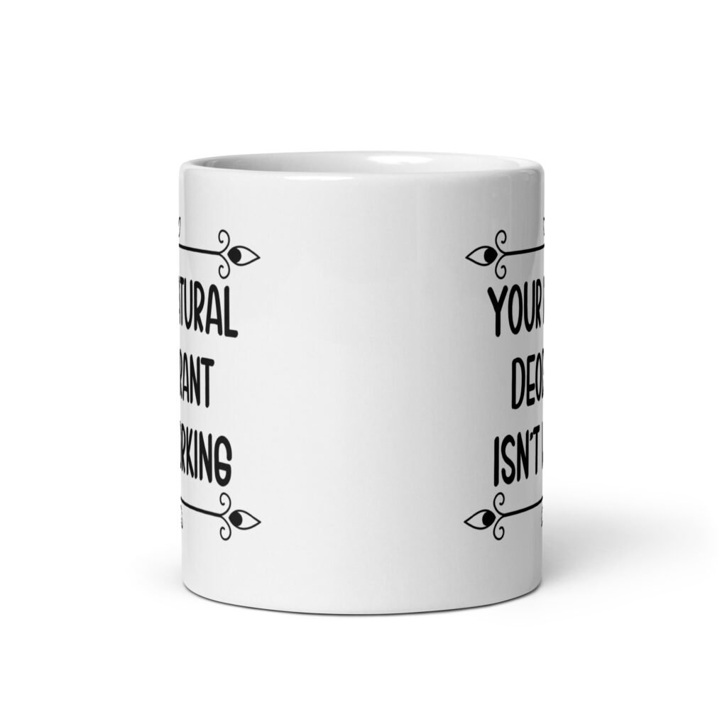 White ceramic mug with the text 'Your natural deodorant isn't working' printed on both sides