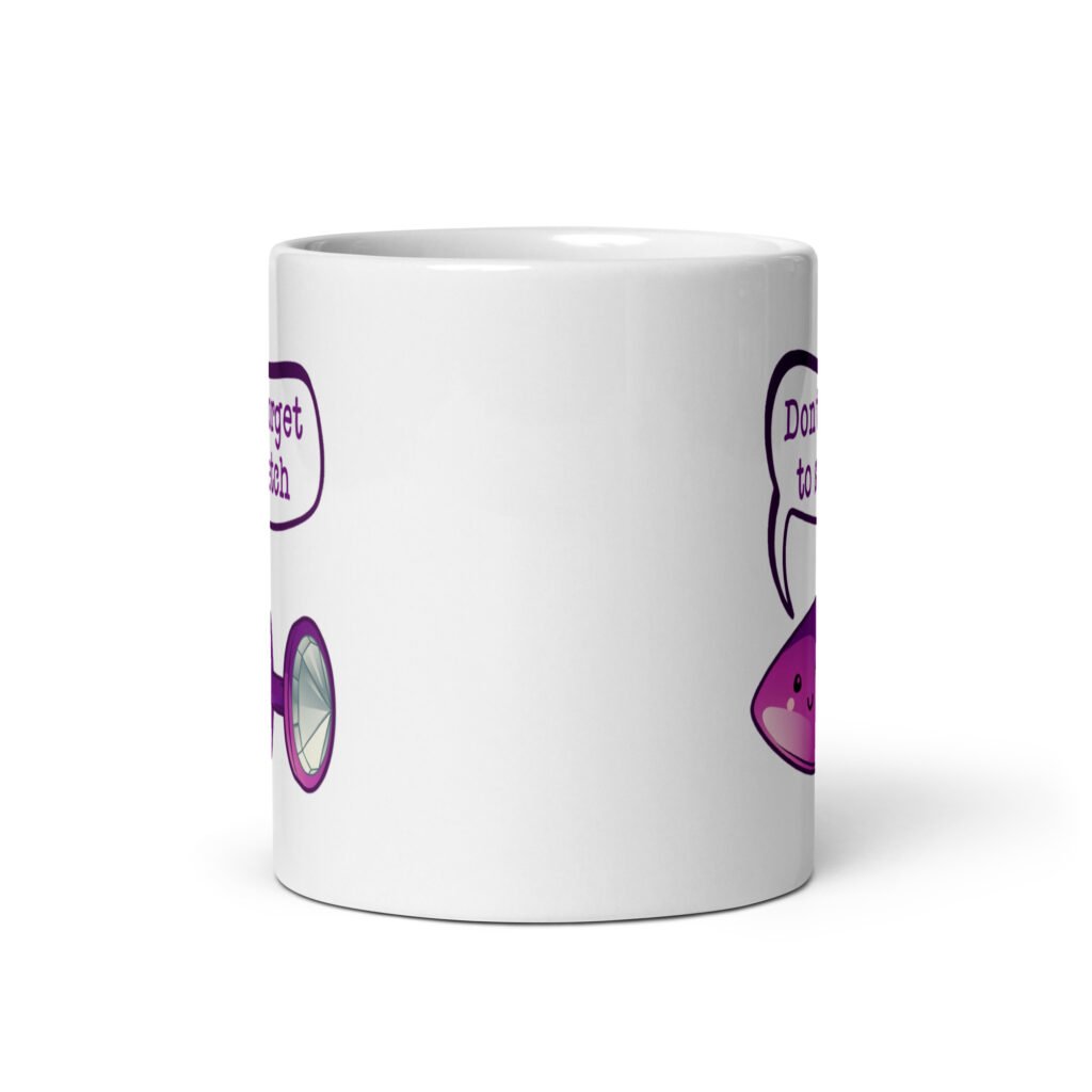 White ceramic coffee mug that has image of a purple anal plug with a smile face. There is a speech bubble above with the words 'Don't forget to stretch'. The graphics are printed on both sides of the mug.