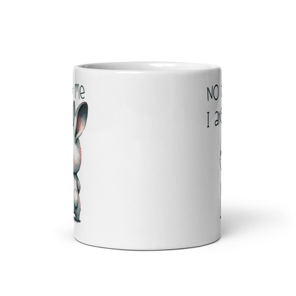 White ceramic coffee mug with an image of an angry bunny and the text 'No talk me I angy' printed on both sides of the mug.