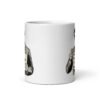 White ceramic coffee mug with graphic of retro man holding sign that says 'Ladies, mansplaining is short for man explaining' printed on both sides.