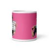 White ceramic coffee mug with pink color wrapped around. The mug has a graphic of an angry looking retro woman holding a knife and a sign. The sign says 'Tell me to calm down. I dare you.' The graphic is printed on both sides of the mug.