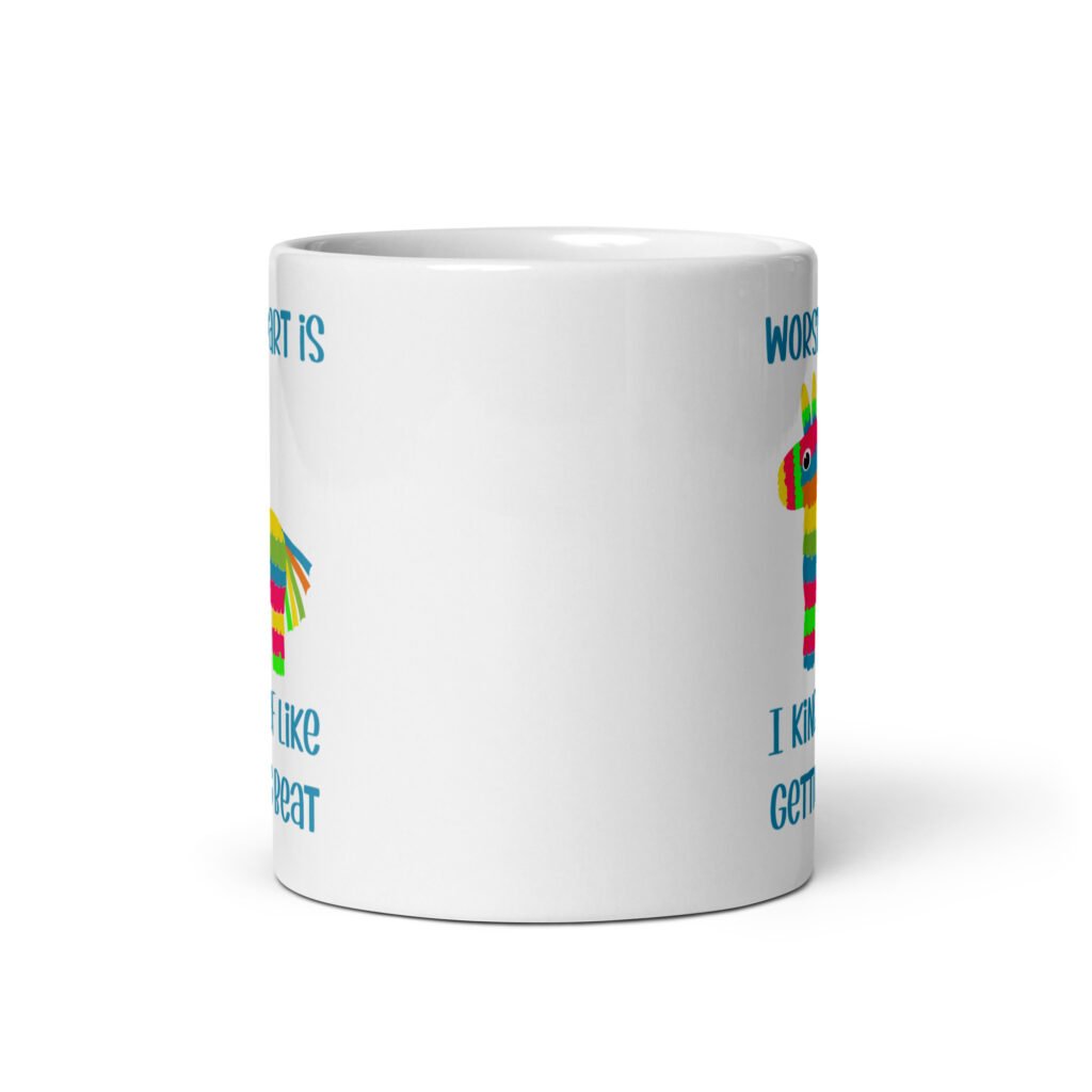 White ceramic coffee mug with an image of a colorful donkey pinata with the words 'Worst part is I kind of like getting beat' printed on both sides.