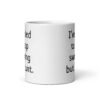 White ceramic coffee mug with the text 'I've tried to stop swearing but I cunt.' printed on both sides.