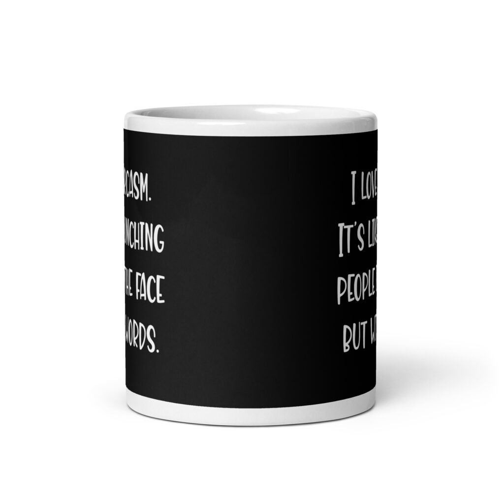 Black and white coffee mug with the text 'I love sarcasm. It's like punching people in the face but with words' printed on both sides.
