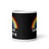 Black and white ceramic coffee mug that has an image of a rainbow and the text 'Sounds gay... I'm in.' printed on both sides.