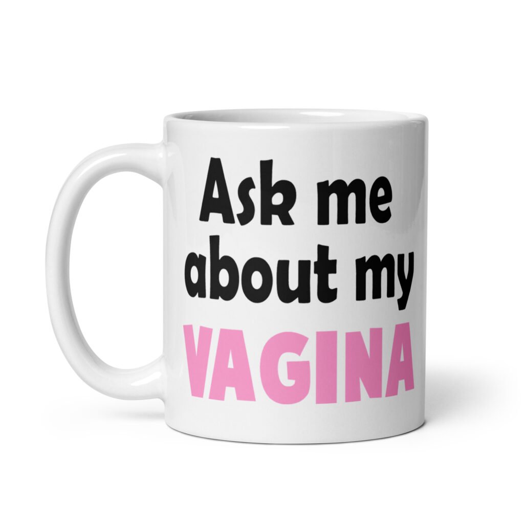 White ceramic mug with the text 'Ask me about my vagina' printed on both sides.