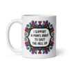 White ceramic mug with a colorful doodle graphic and the words 'I support a man's right to shut the hell up.' The design is printed on both sides of the mug.