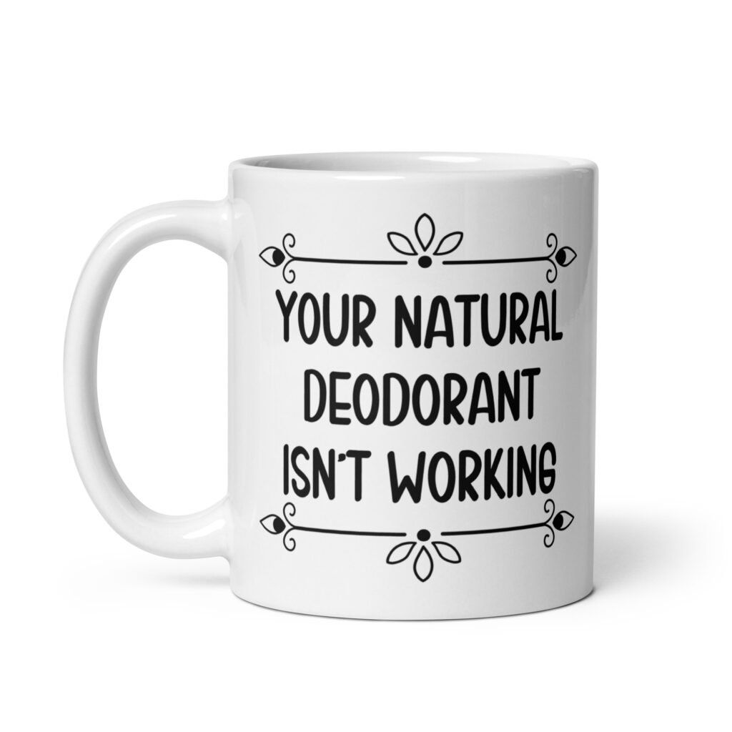 White ceramic mug with the text 'Your natural deodorant isn't working' printed on both sides