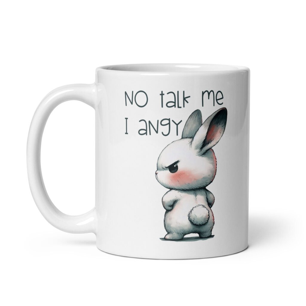 White ceramic coffee mug with an image of an angry bunny and the text 'No talk me I angy' printed on both sides of the mug.