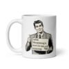 White ceramic coffee mug with graphic of retro man holding sign that says 'Ladies, mansplaining is short for man explaining' printed on both sides.
