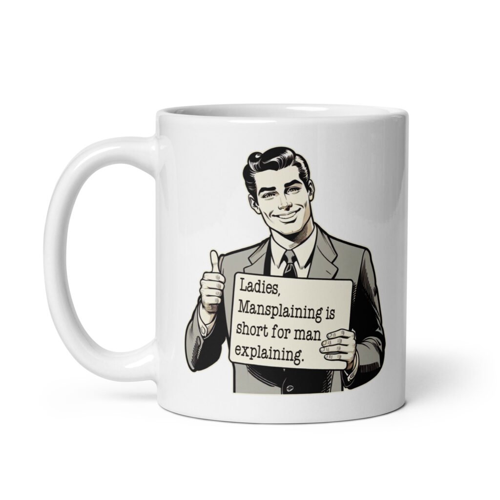 White ceramic coffee mug with graphic of retro man holding sign that says 'Ladies, mansplaining is short for man explaining' printed on both sides.