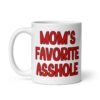 White ceramic mug with the text 'Mom's favorite asshole' printed in red on both sides of the mug.