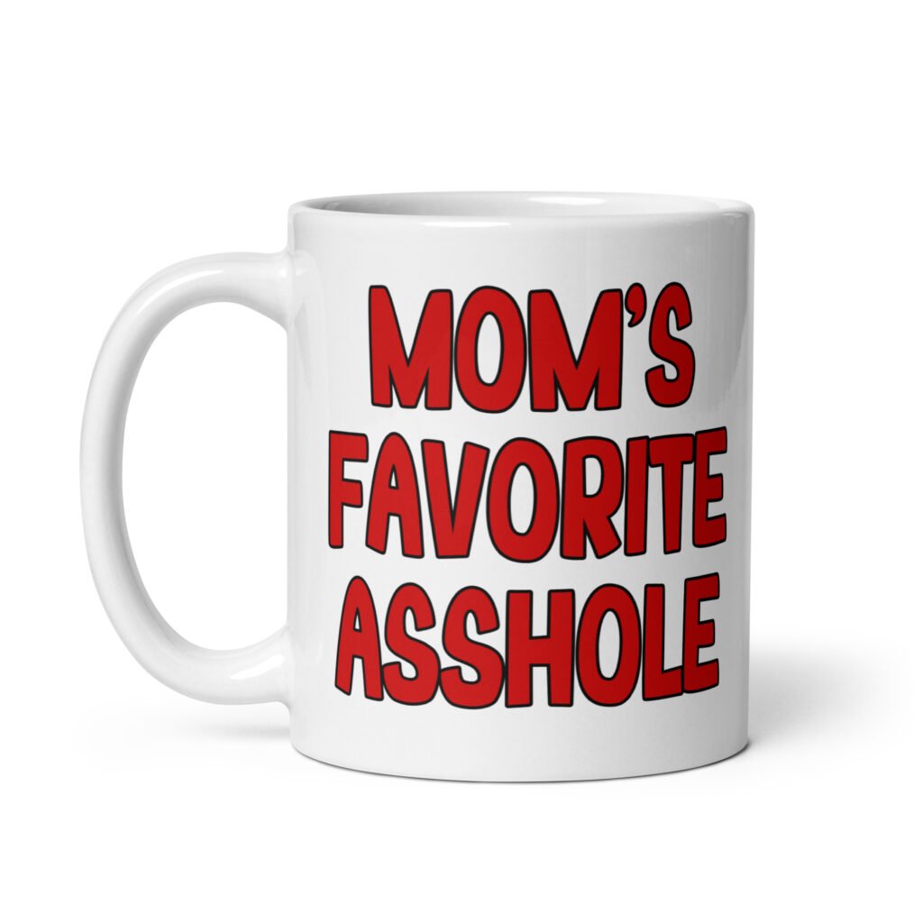 White ceramic mug with the text 'Mom's favorite asshole' printed in red on both sides of the mug.