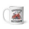 White ceramic coffee mug with a circus theme graphic and the text 'Ringmaster of the Shitshow' printed on both sides.