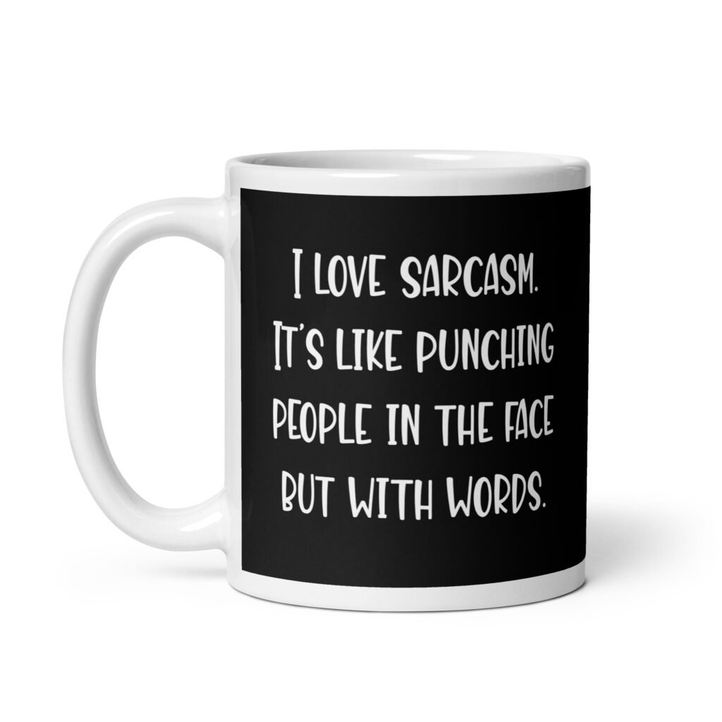 Black and white coffee mug with the text 'I love sarcasm. It's like punching people in the face but with words' printed on both sides.