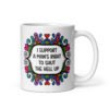 White ceramic mug with a colorful doodle graphic and the words 'I support a man's right to shut the hell up.' The design is printed on both sides of the mug.