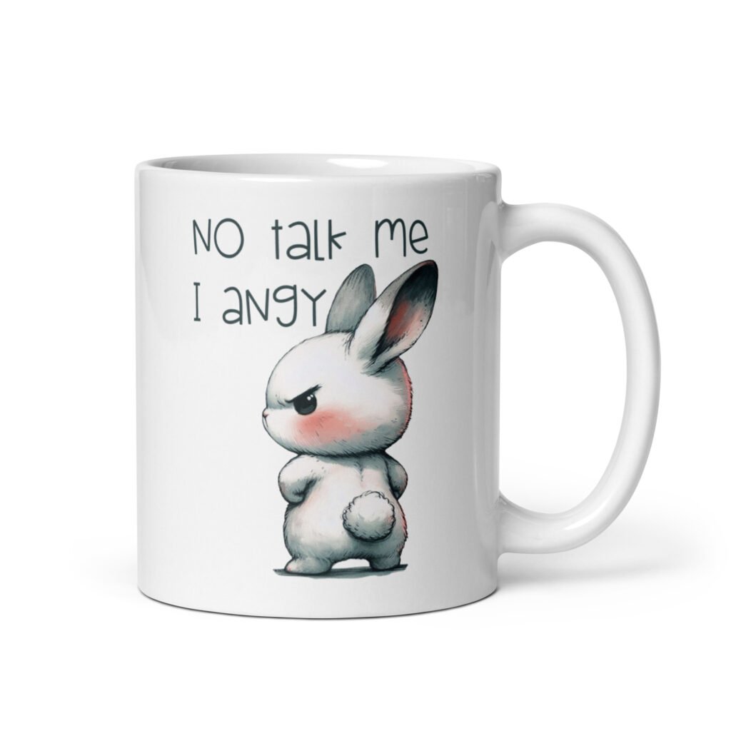 White ceramic coffee mug with an image of an angry bunny and the text 'No talk me I angy' printed on both sides of the mug.