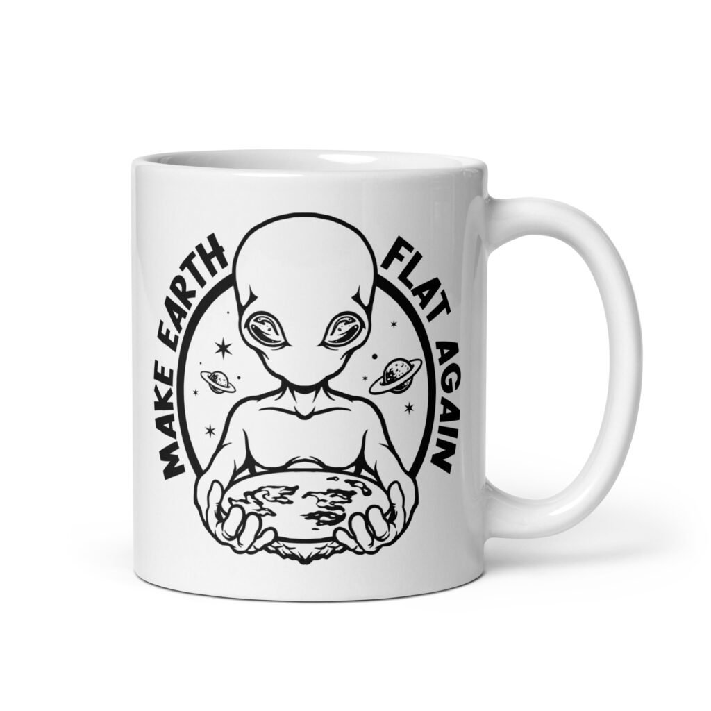 White ceramic coffee mug with an image of an alien holding a flat earth and the phrase 'Make earth flat again' printed on both sides.
